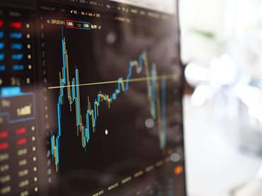 Computer terminal displaying asset price graph