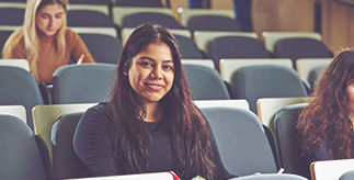 Students sitting in a lecture theatre